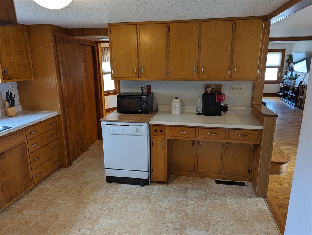 125 Plumtree Road Sunderland, MA 01375 - Photo 22 of 41 a kitchen with a sink stove and cabinets