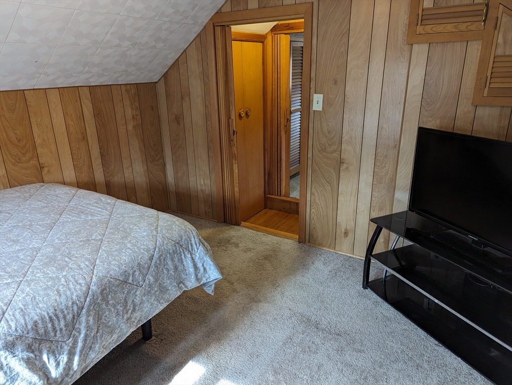 125 Plumtree Road Sunderland, MA 01375 - Photo 24 of 41 a bedroom with a bed and furniture