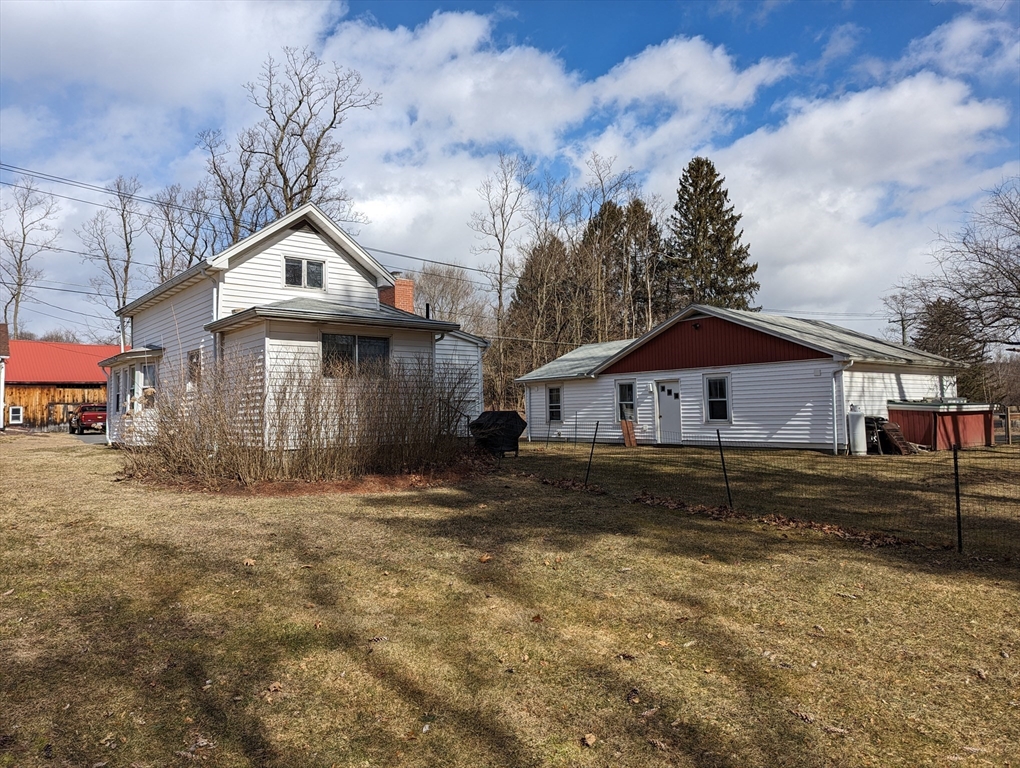 125 Plumtree Road Sunderland, MA 01375 - Photo 31 of 41 a front view of a house with a yard