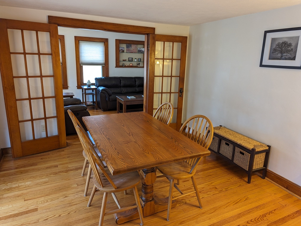 125 Plumtree Road Sunderland, MA 01375 - Photo 7 of 41 a view of a dining room with furniture and window