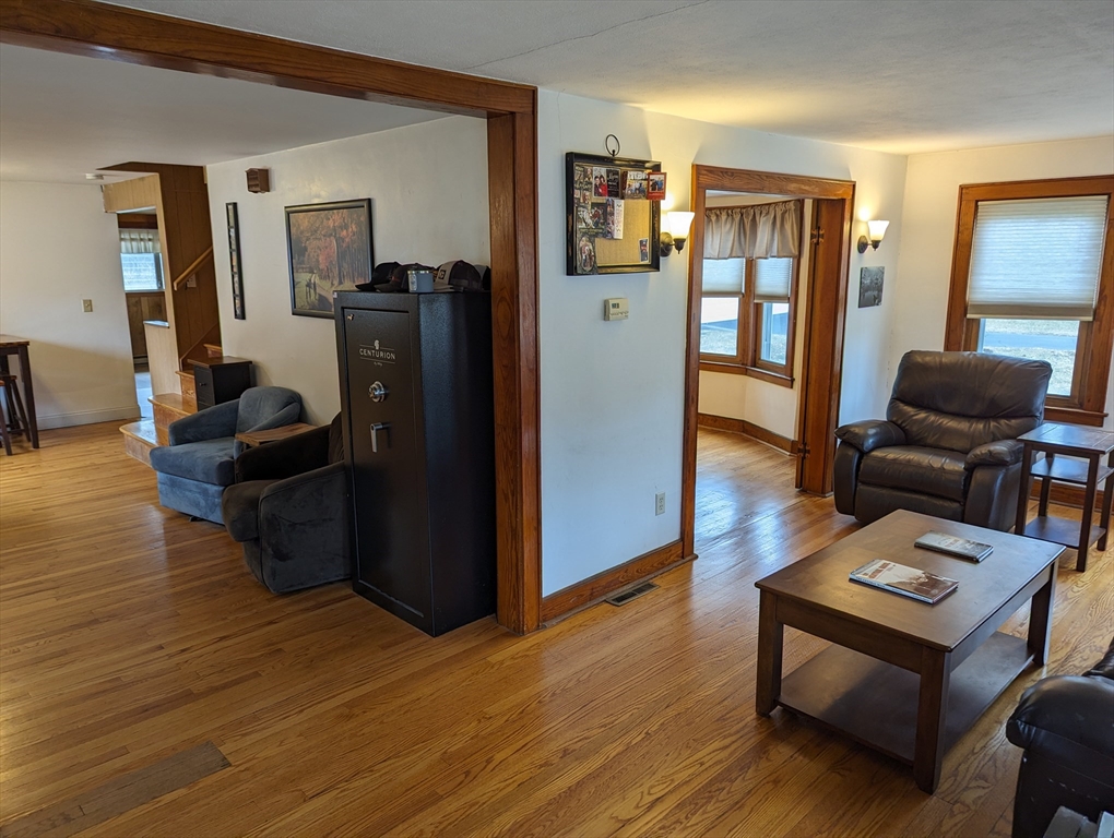 125 Plumtree Road Sunderland, MA 01375 - Photo 10 of 41 a living room with furniture and wooden floor