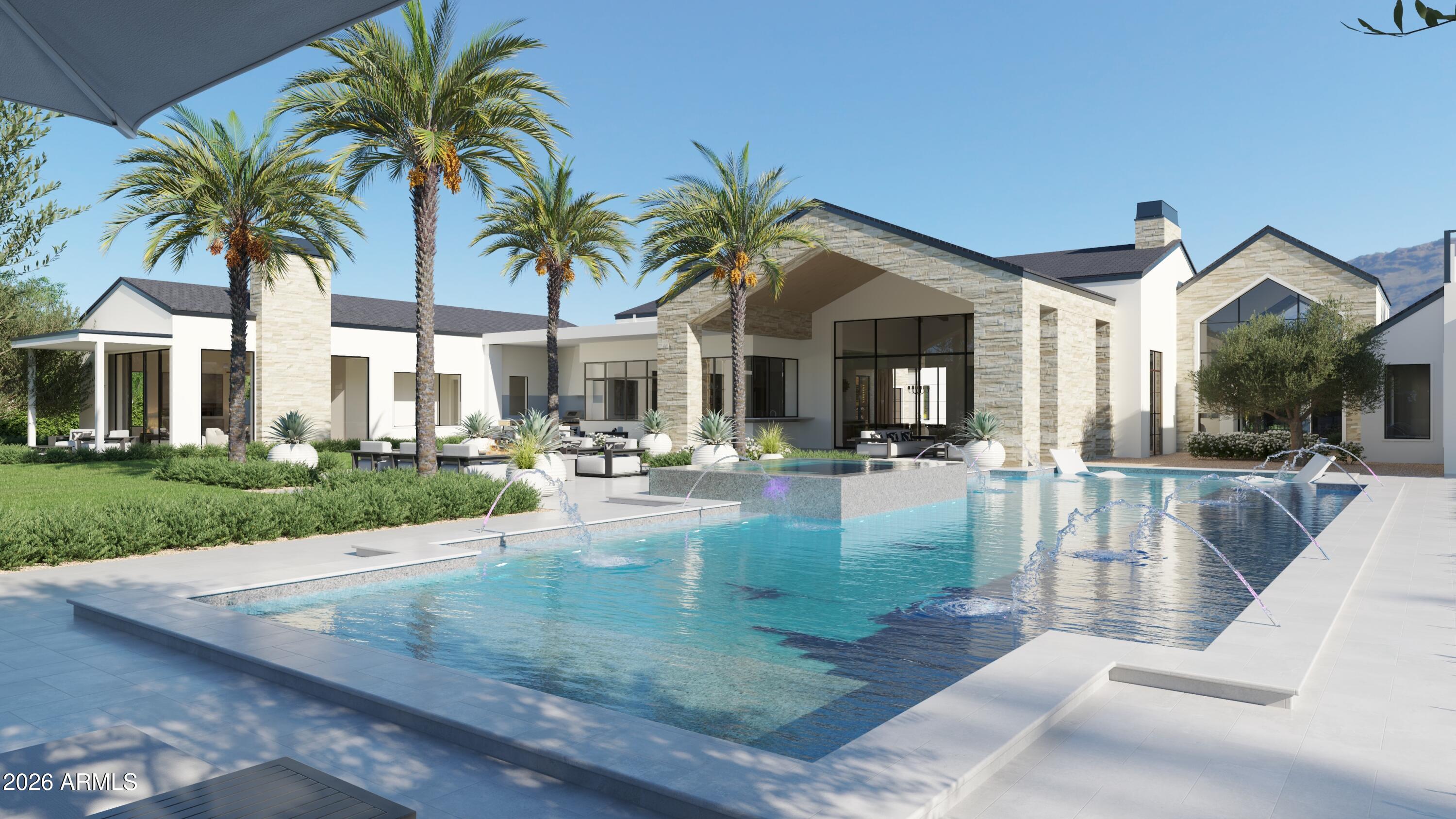 a view of a house with swimming pool and sitting area