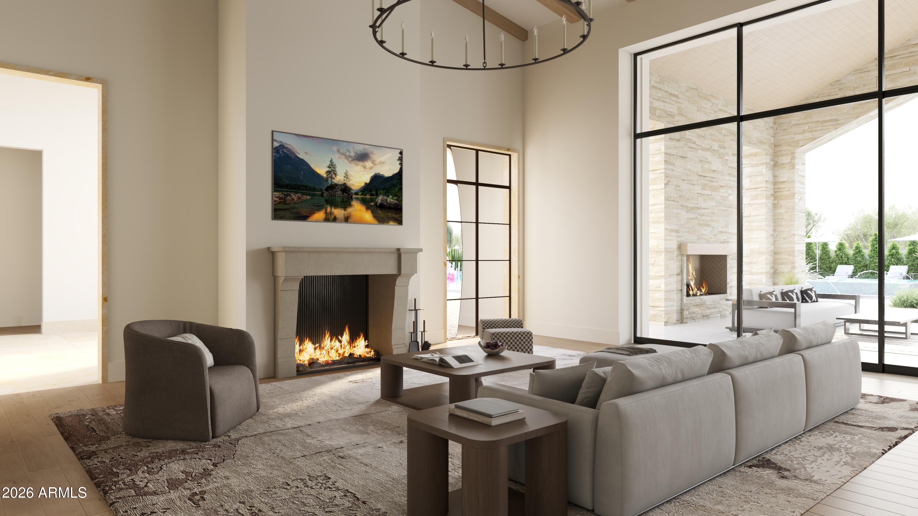 5009 East Roadrunner Road Paradise Valley, AZ 85253 - Photo 13 of 36 a living room with furniture two window and a fireplace