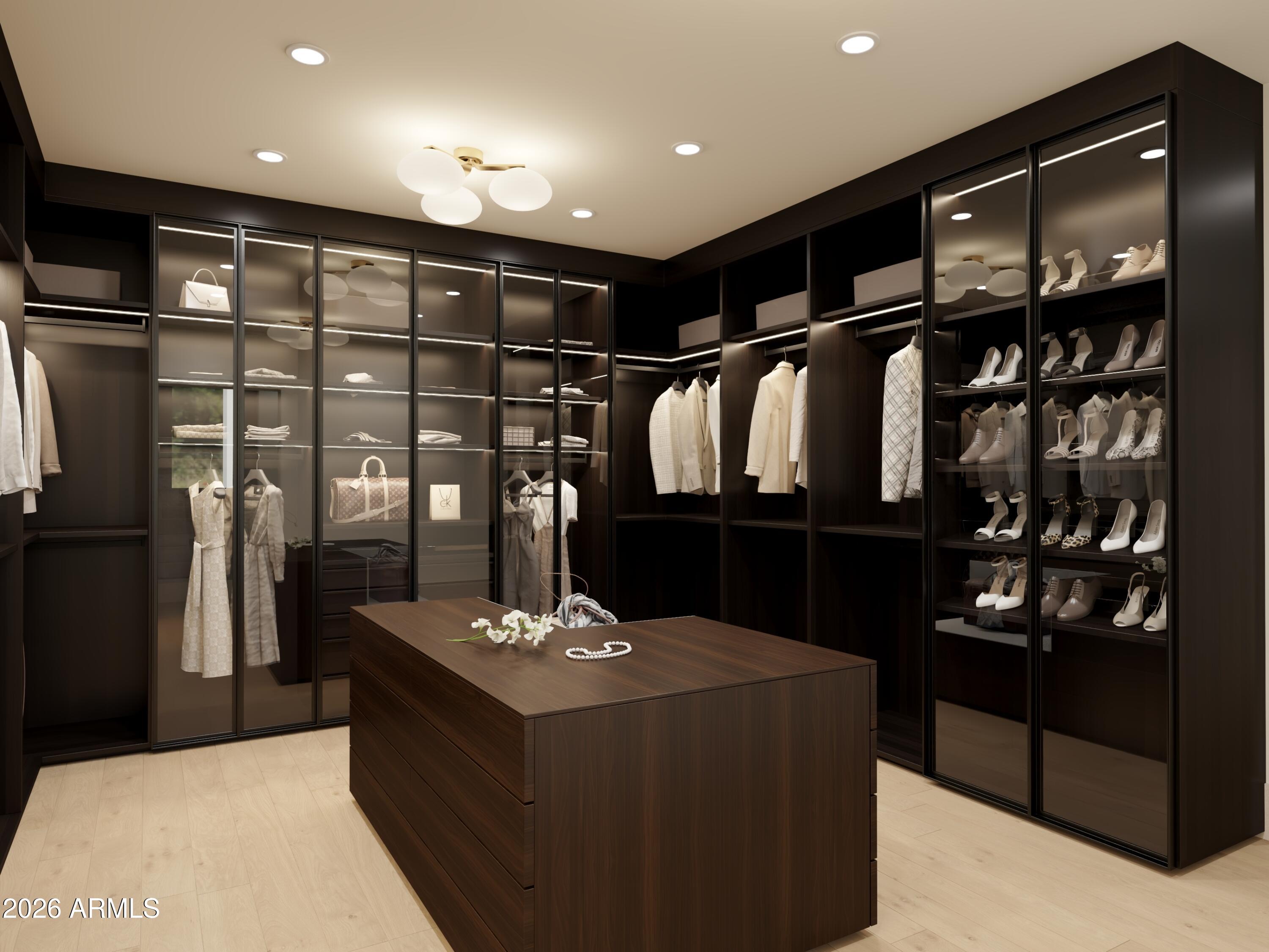 5009 East Roadrunner Road Paradise Valley, AZ 85253 - Photo 24 of 36 a kitchen with stainless steel appliances kitchen island granite countertop a refrigerator and a sink