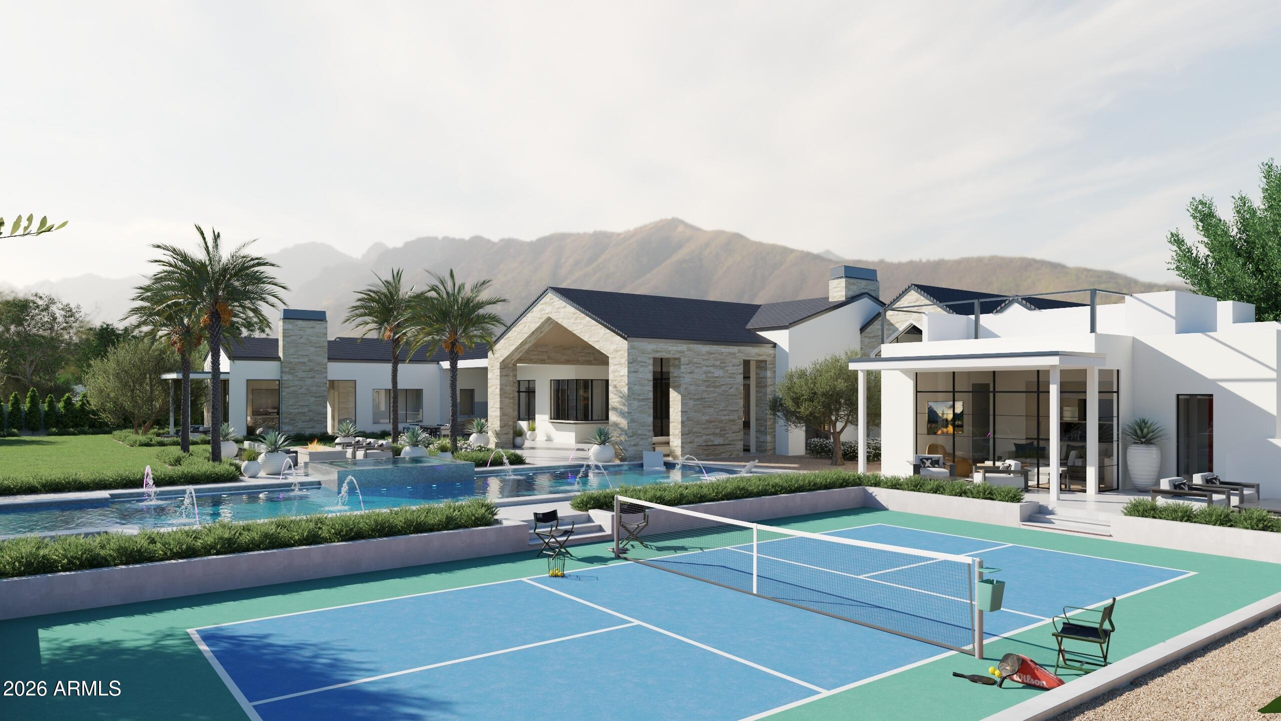 5009 East Roadrunner Road Paradise Valley, AZ 85253 - Photo 5 of 36 a view of a building with a swimming pool and a chairs