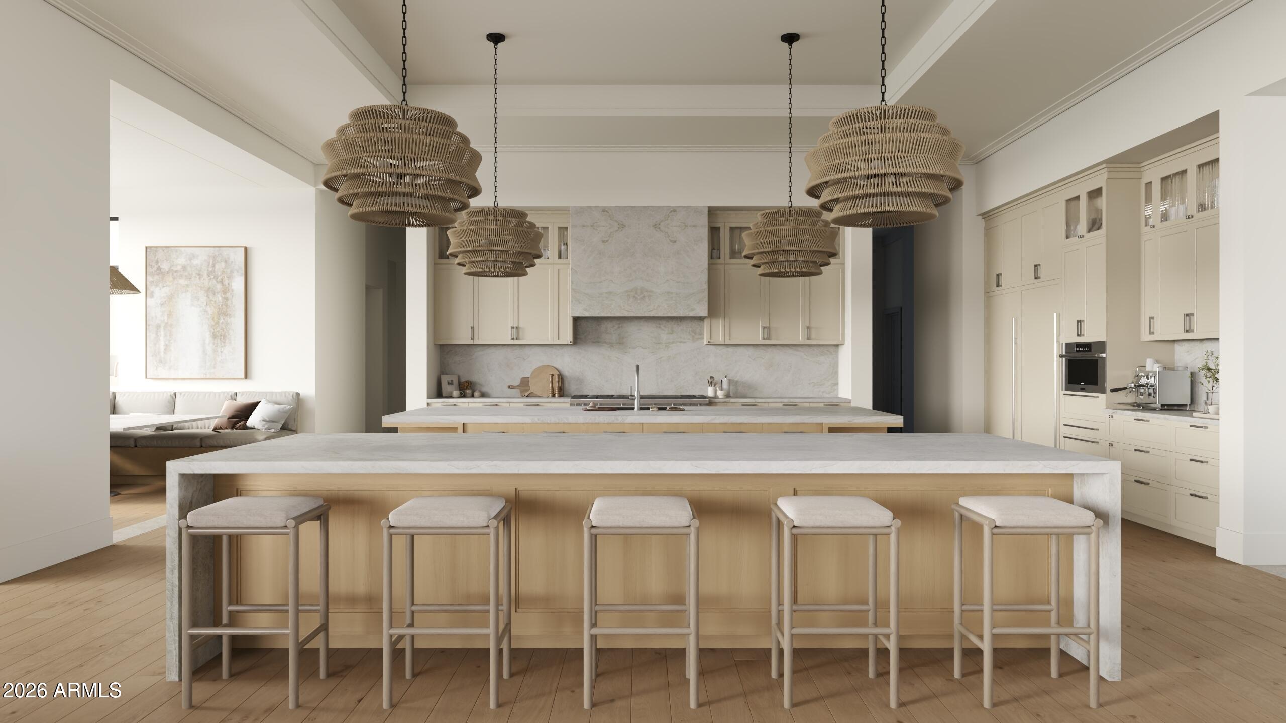 5009 East Roadrunner Road Paradise Valley, AZ 85253 - Photo 6 of 36 a kitchen with a chandelier a sink stainless steel appliances and cabinets