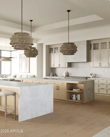 a kitchen with stainless steel appliances granite countertop a sink a stove and a wooden floors