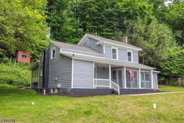 a view of a house with a swimming pool