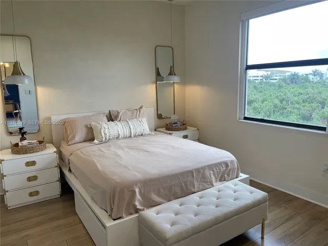 a bathroom with a sink mirror vanity and toilet