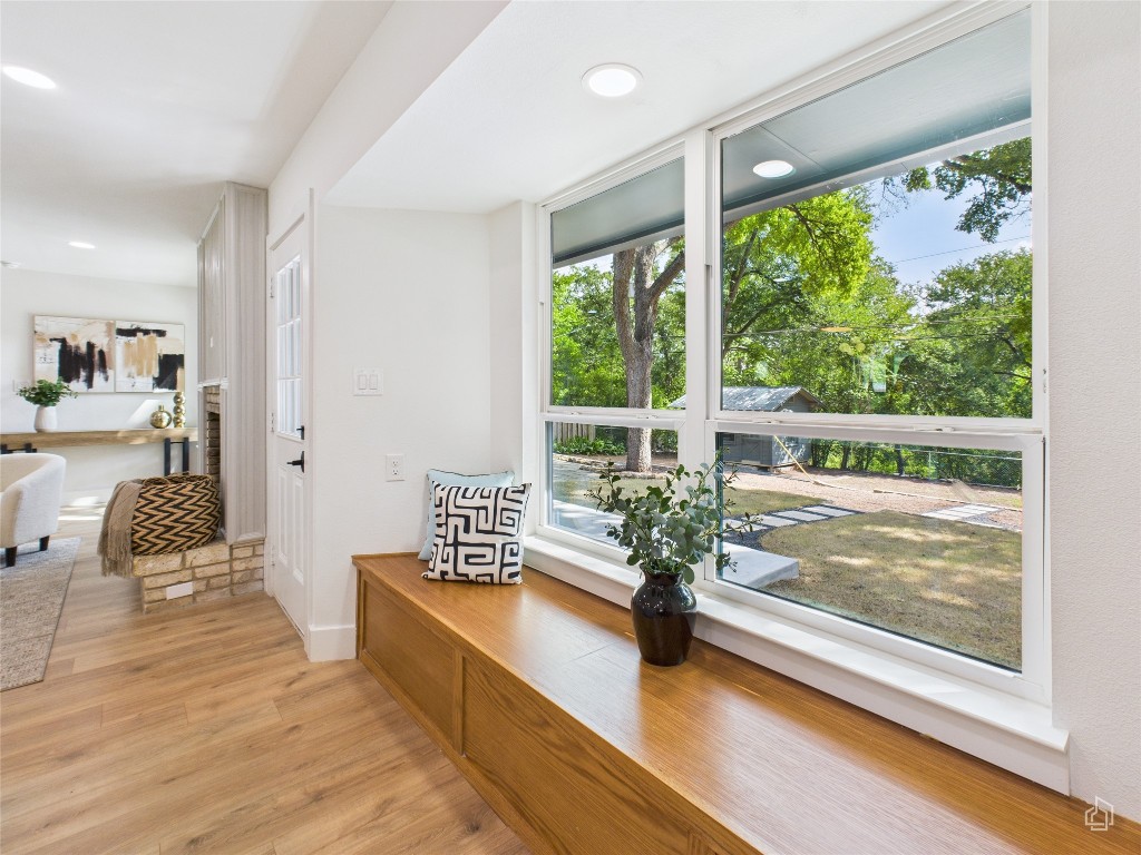 7019 Creighton Lane Austin, TX 78723 - Photo 19 of 40 a room with natural light and wooden floor