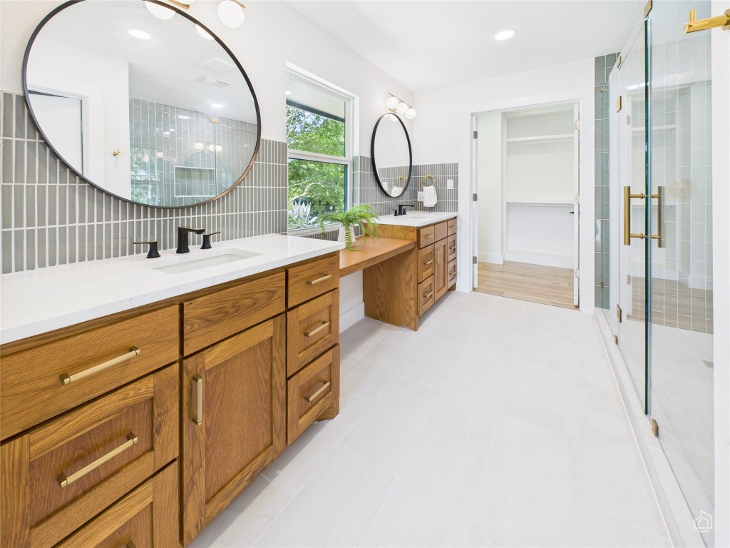 7019 Creighton Lane Austin, TX 78723 - Photo 23 of 40 a kitchen with cabinets and a sink