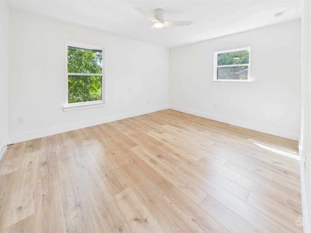 7019 Creighton Lane Austin, TX 78723 - Photo 26 of 40 wooden floor in a room