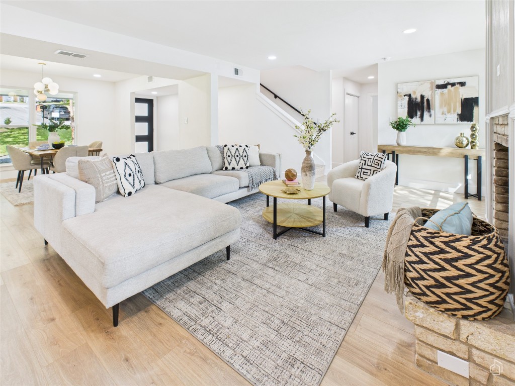 7019 Creighton Lane Austin, TX 78723 - Photo 8 of 40 a bedroom with furniture and a couch