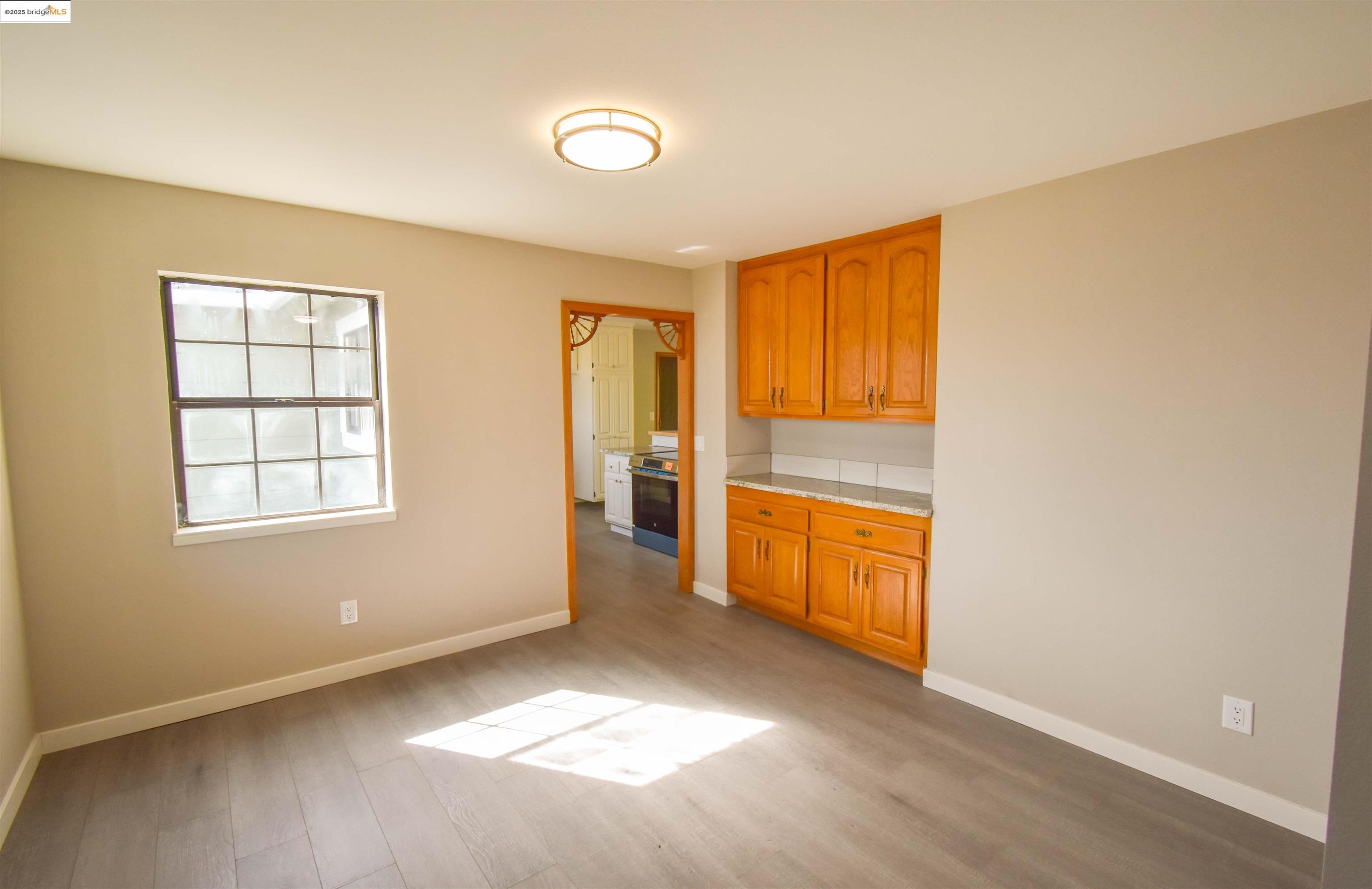 13300 Lone Bend Road Jamestown, CA 95327 - Photo 12 of 50 a view of an empty room with a window