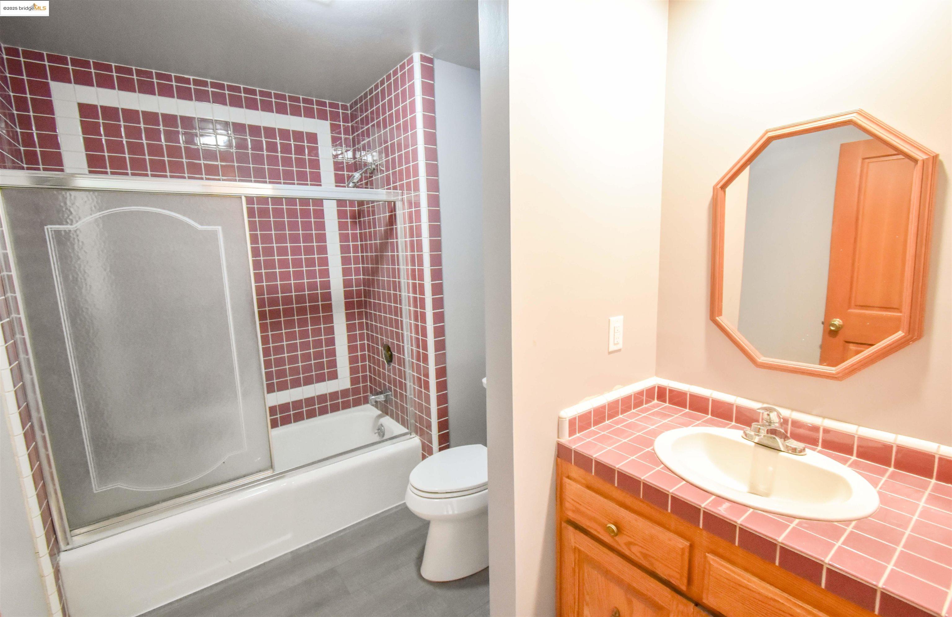 13300 Lone Bend Road Jamestown, CA 95327 - Photo 32 of 50 a bathroom with a sink toilet and shower