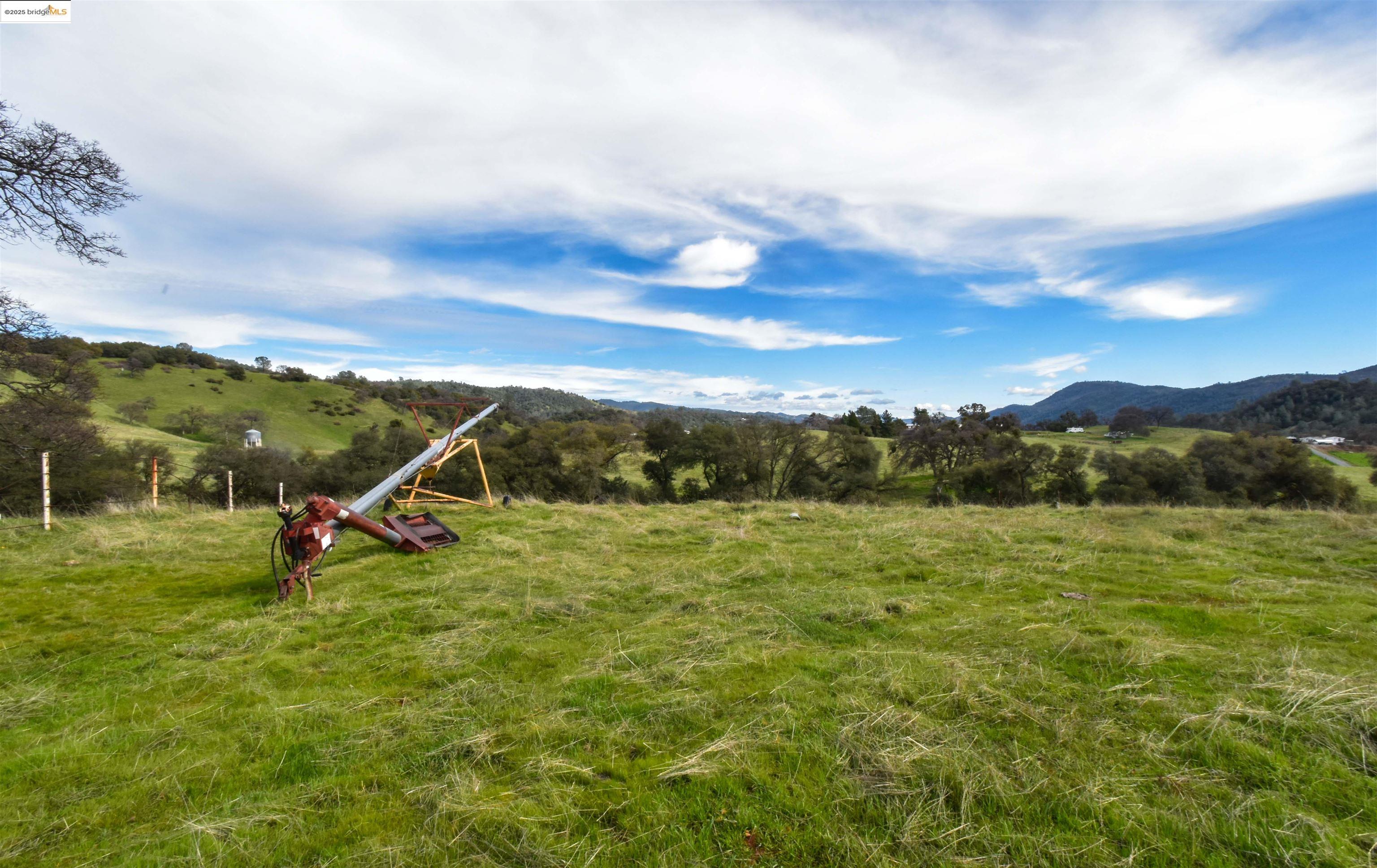 13300 Lone Bend Road Jamestown, CA 95327 - Photo 41 of 50 a view of a mountain with a yard