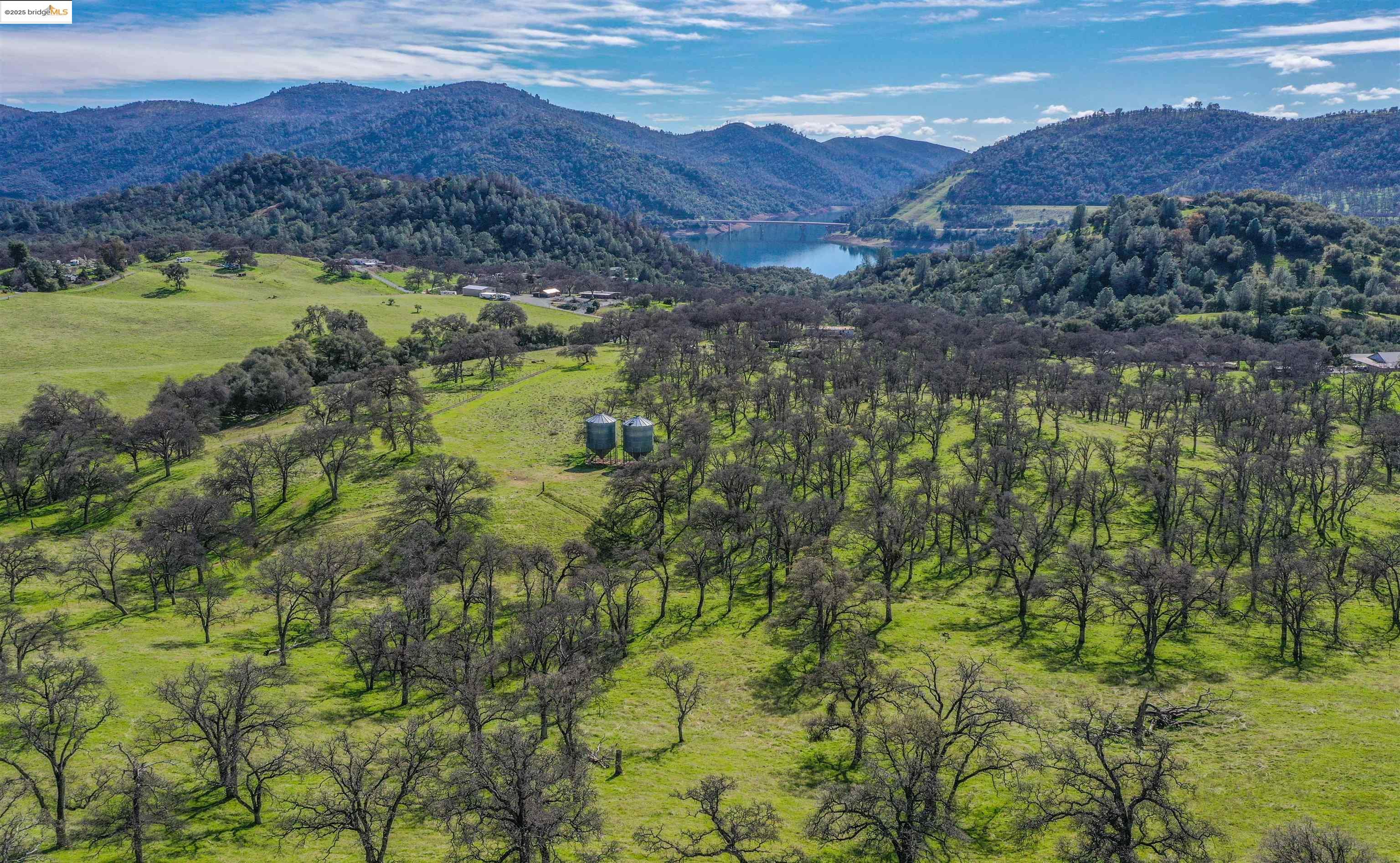 13300 Lone Bend Road Jamestown, CA 95327 - Photo 46 of 50 a view of a lush green hillside and houses