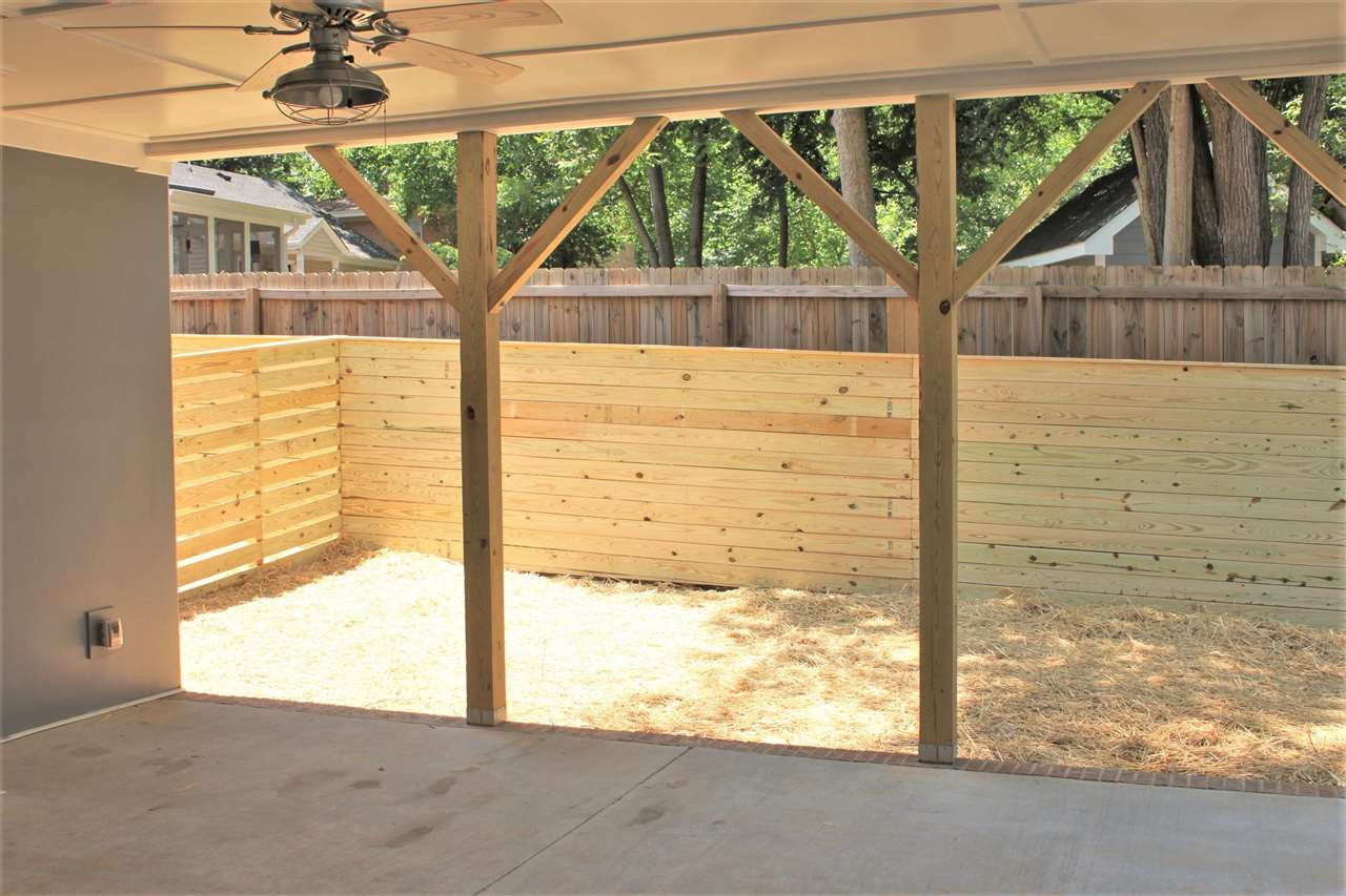 202 Parrish Street Raleigh, NC 27610 - Photo 12 of 14 Absolutely perfect space for outdoor enjoyment...including a gas fireplace and ceiling fan. Covered Patio