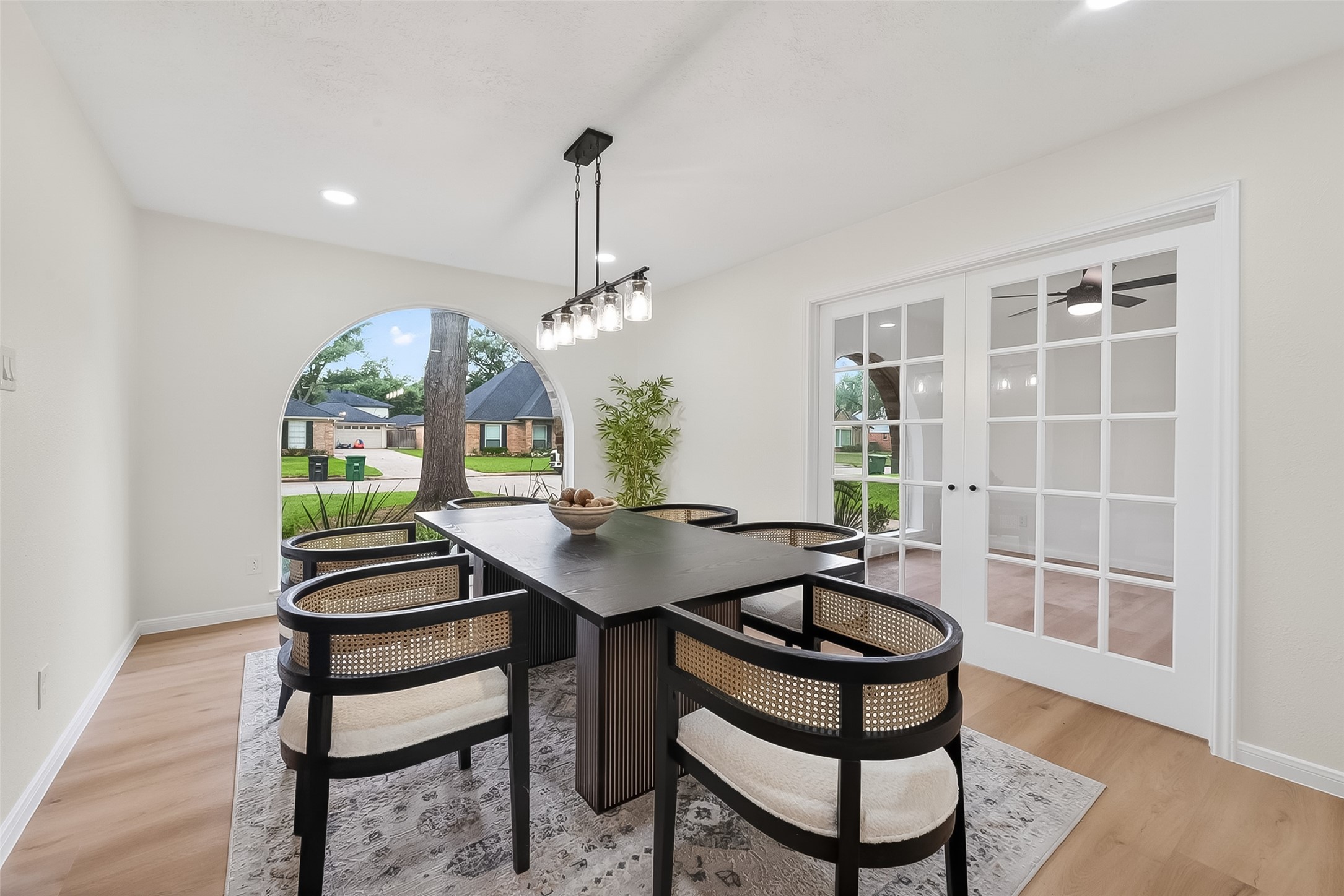 2914 Riata Lane Houston, TX 77043 - Photo 20 of 46 a view of a dining room with furniture window and wooden floor