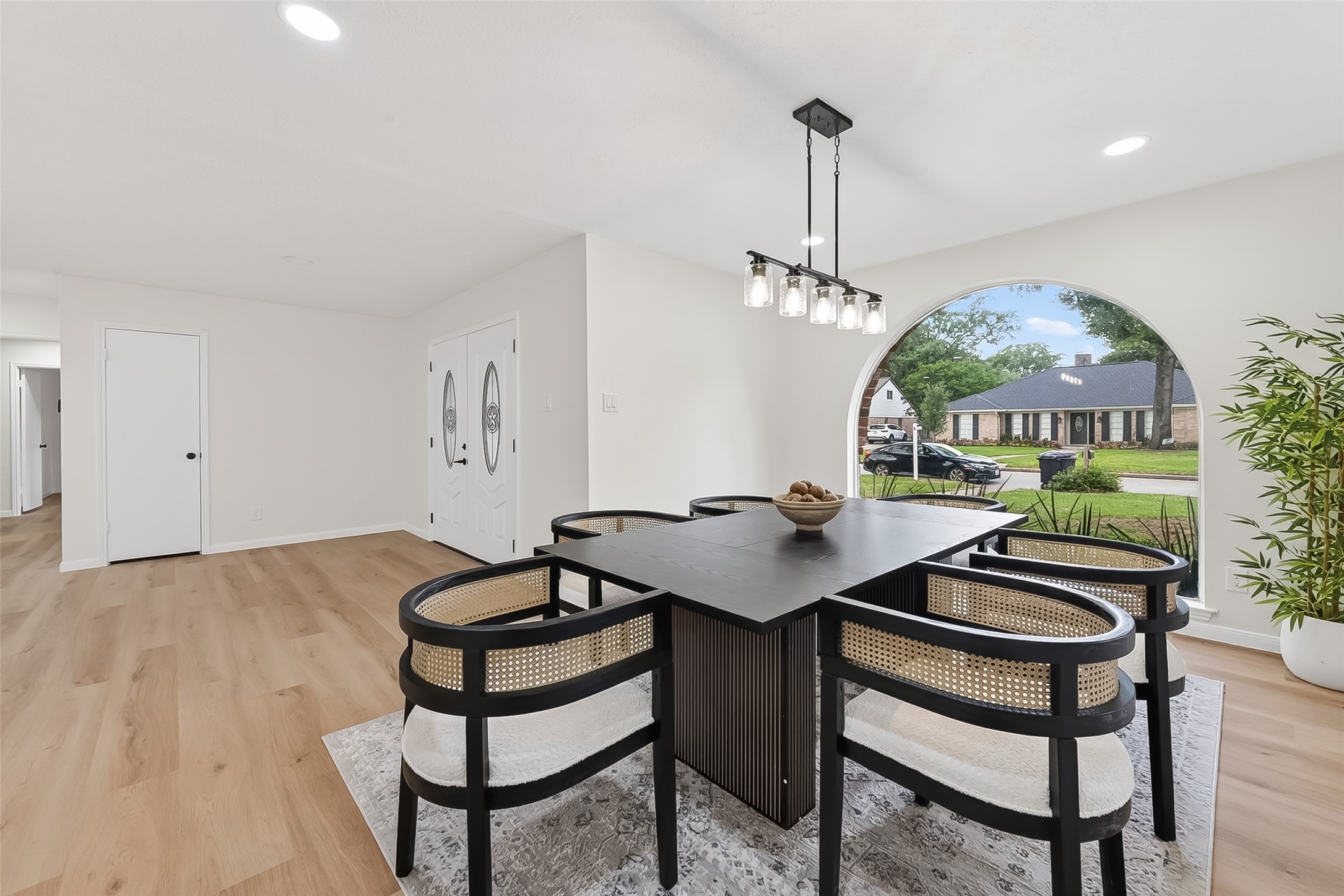 2914 Riata Lane Houston, TX 77043 - Photo 21 of 46 a view of a dining room with furniture and chandelier