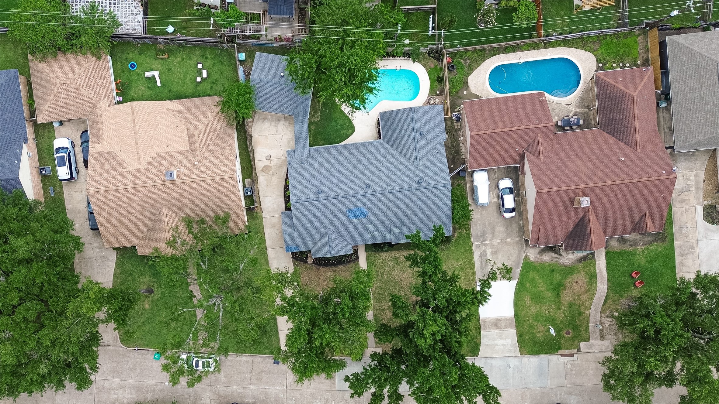 2914 Riata Lane Houston, TX 77043 - Photo 3 of 46 an aerial view of house with outdoor space and a swimming pool