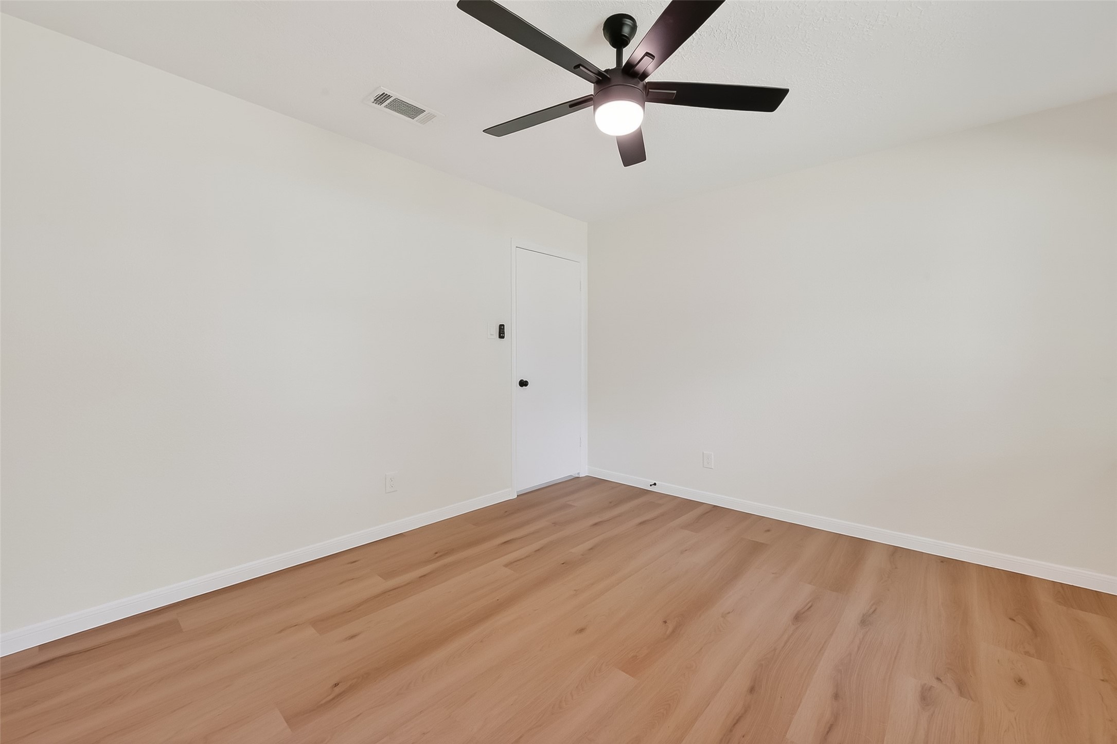 2914 Riata Lane Houston, TX 77043 - Photo 31 of 46 wooden floor in an empty room