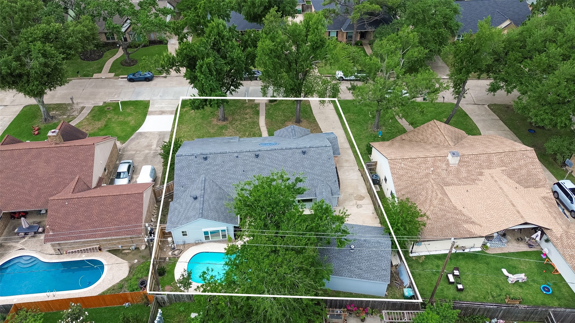 2914 Riata Lane Houston, TX 77043 - Photo 44 of 46 an aerial view of a house with garden space pool seating area and yard