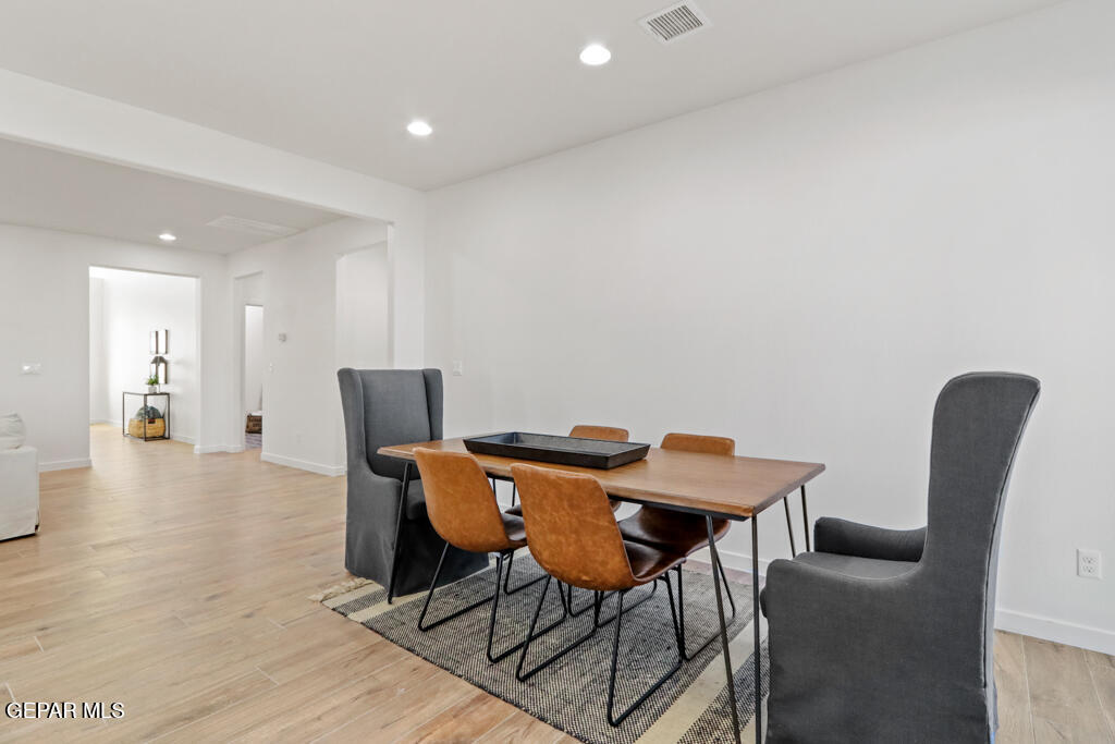 14952 Hill Ridge El Paso, TX 79938 - Photo 14 of 38 a view of a dining room with furniture and wooden floor