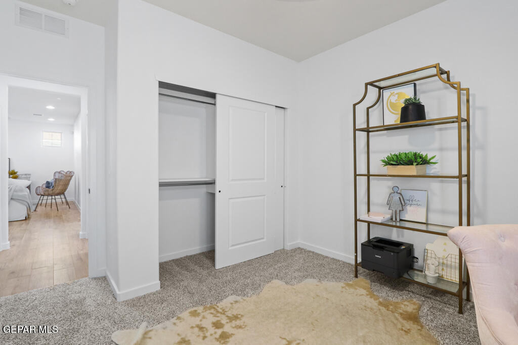 14952 Hill Ridge El Paso, TX 79938 - Photo 25 of 38 a view of workspace with wooden floor and cabinet