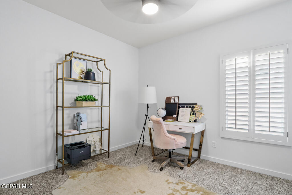 14952 Hill Ridge El Paso, TX 79938 - Photo 36 of 38 a view of a workspace with furniture and a window