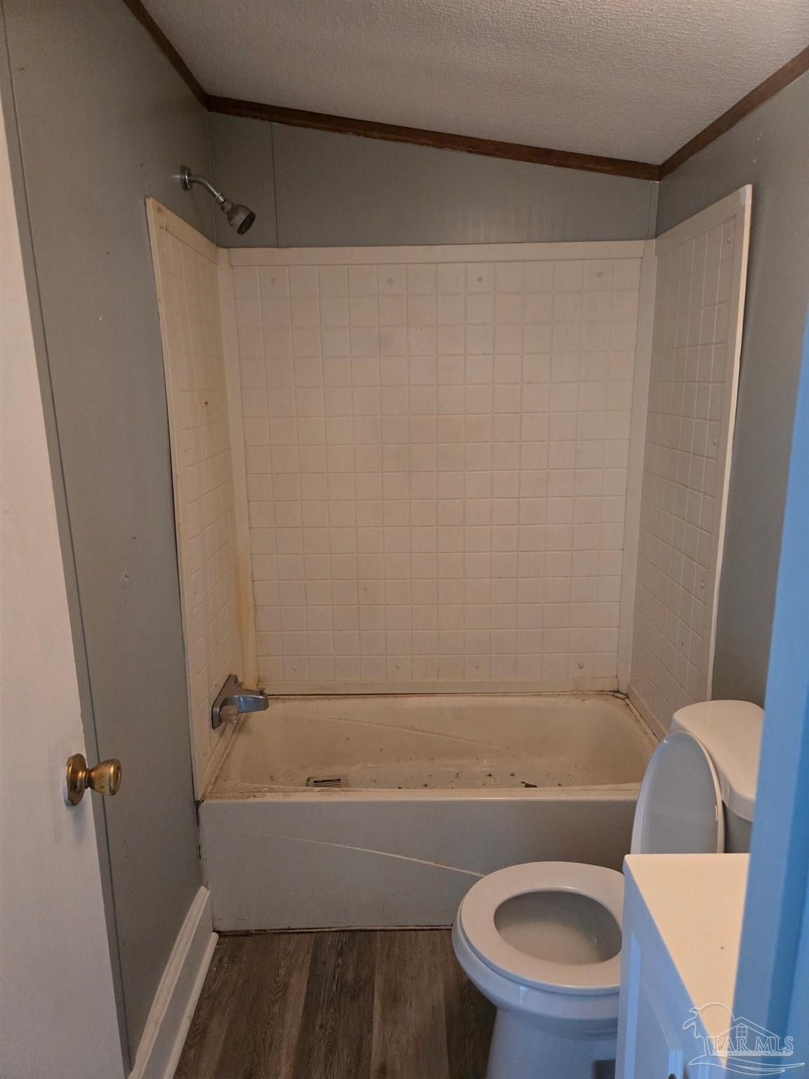 5675 Saufley Field Road, Unit 9 Pensacola, FL 32526 - Photo 6 of 15 a bathroom with a sink and a mirror