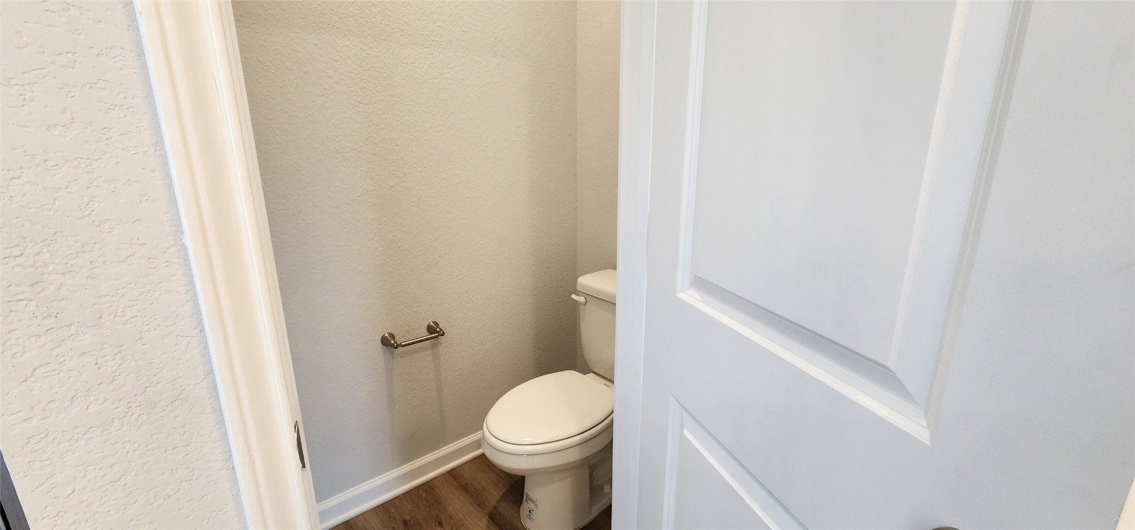 652 Los Olives Lane Georgetown, TX 78628 - Photo 24 of 36 a white toilet sitting next to a shower