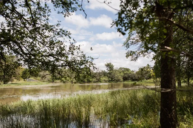 a view of a lake with houses
