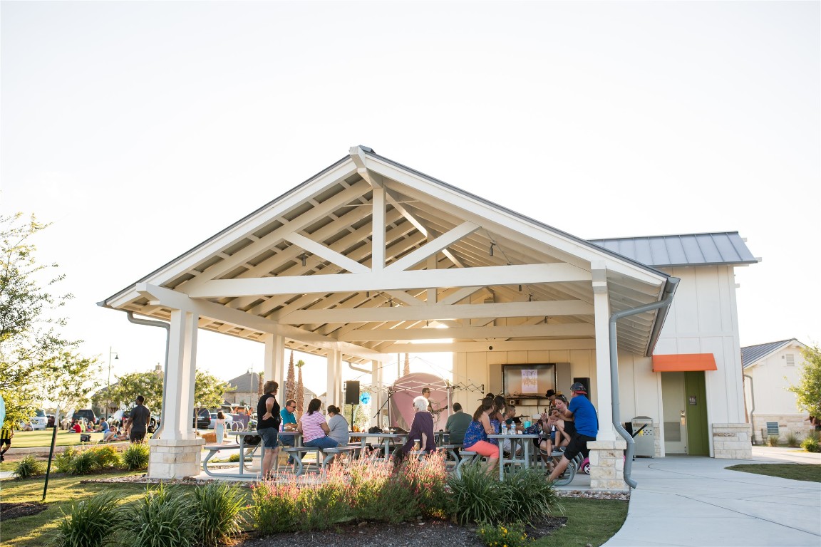 652 Los Olives Lane Georgetown, TX 78628 - Photo 35 of 36 a view of a chairs and tables in patio