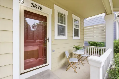 a view of a two chairs in the porch