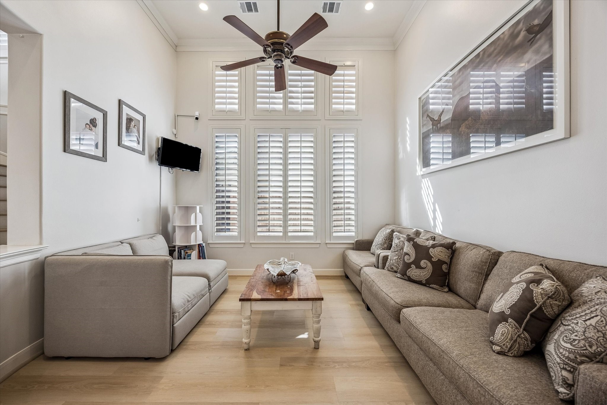 3047 Bonnebridge Way Boulevard Houston, TX 77082 - Photo 15 of 50 This formal living room features light-toned walls, soaring high ceilings, and plantation shutters, creating an ideal space for formal entertaining and comfortable conversation.