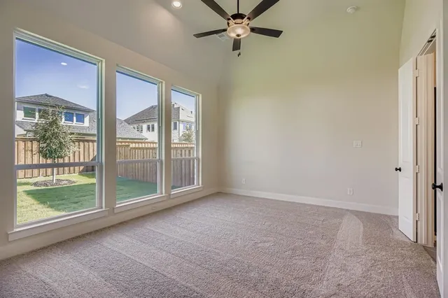 a view of a room with a large window