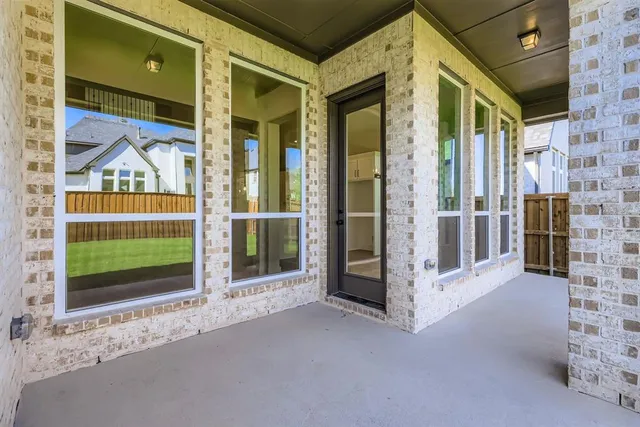 a view of a brick house with front door