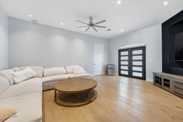 a bathroom with a sink and mirror