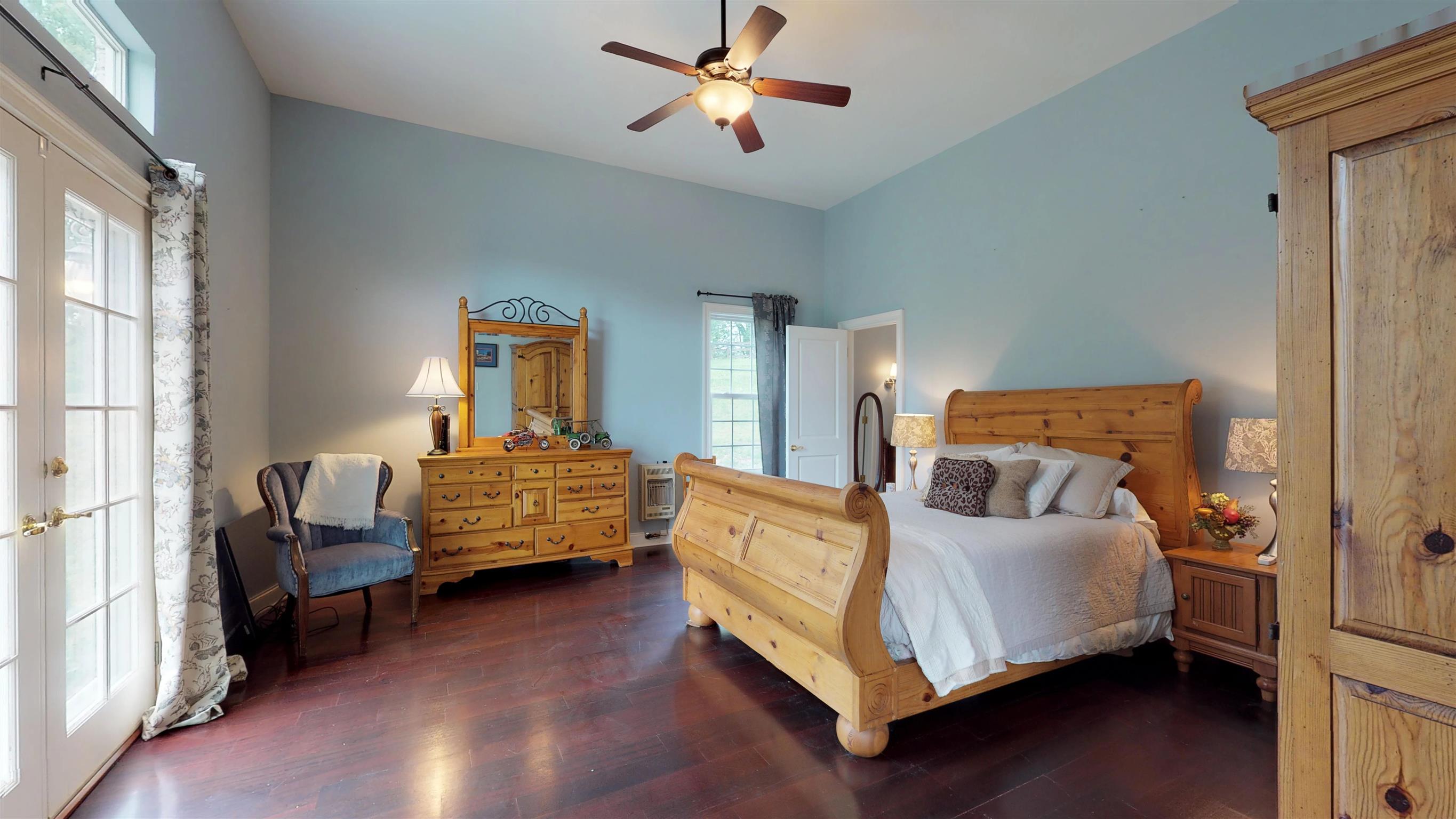 2452 Darks Mill Road Columbia, TN 38401 - Photo 13 of 30 Serene Master Bedroom downstairs has French doors with a transom and hardwood floors