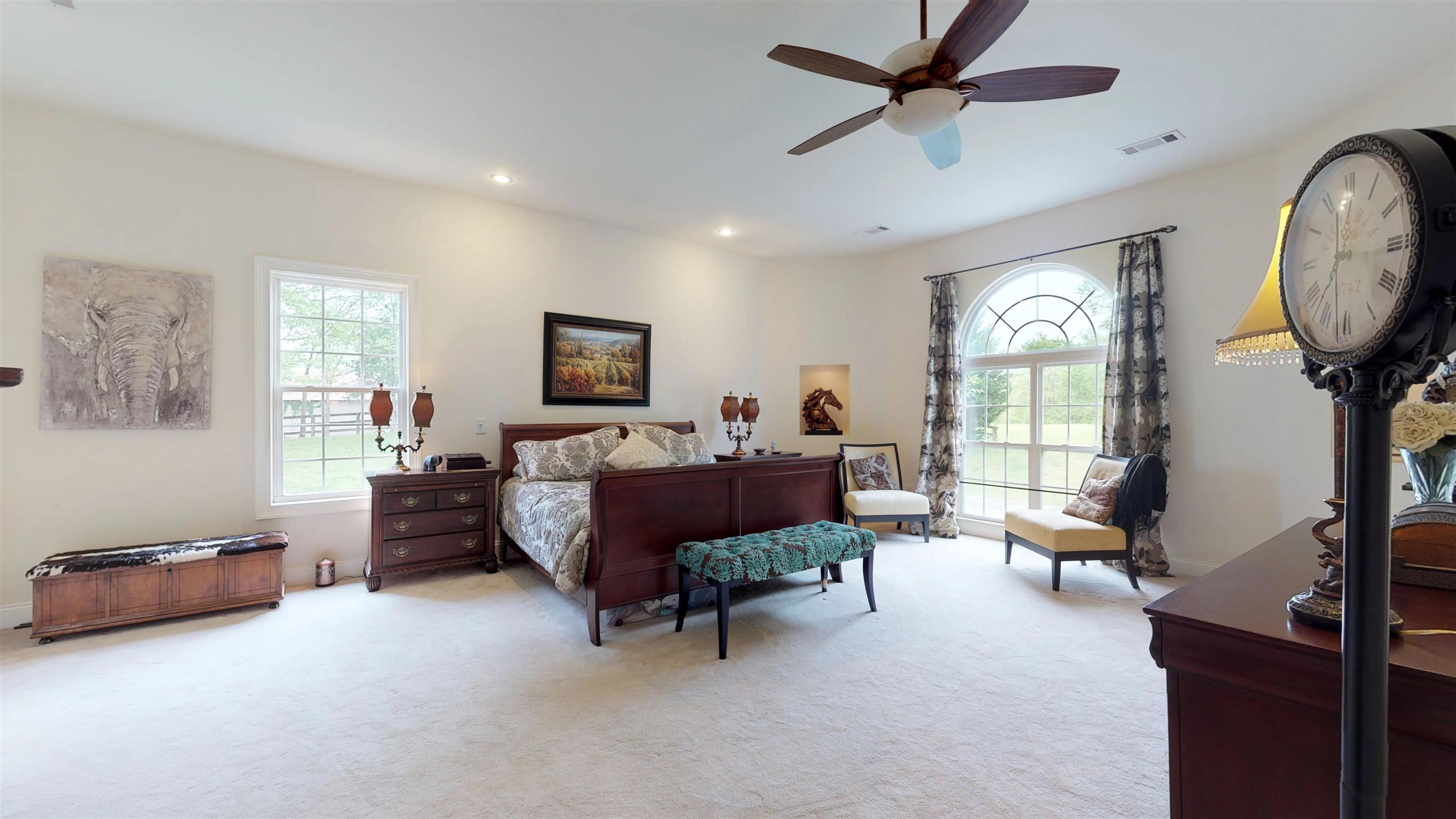 2452 Darks Mill Road Columbia, TN 38401 - Photo 16 of 30 Expansive Master retreat upstairs features a double window with arched transom overlooking the private lush land