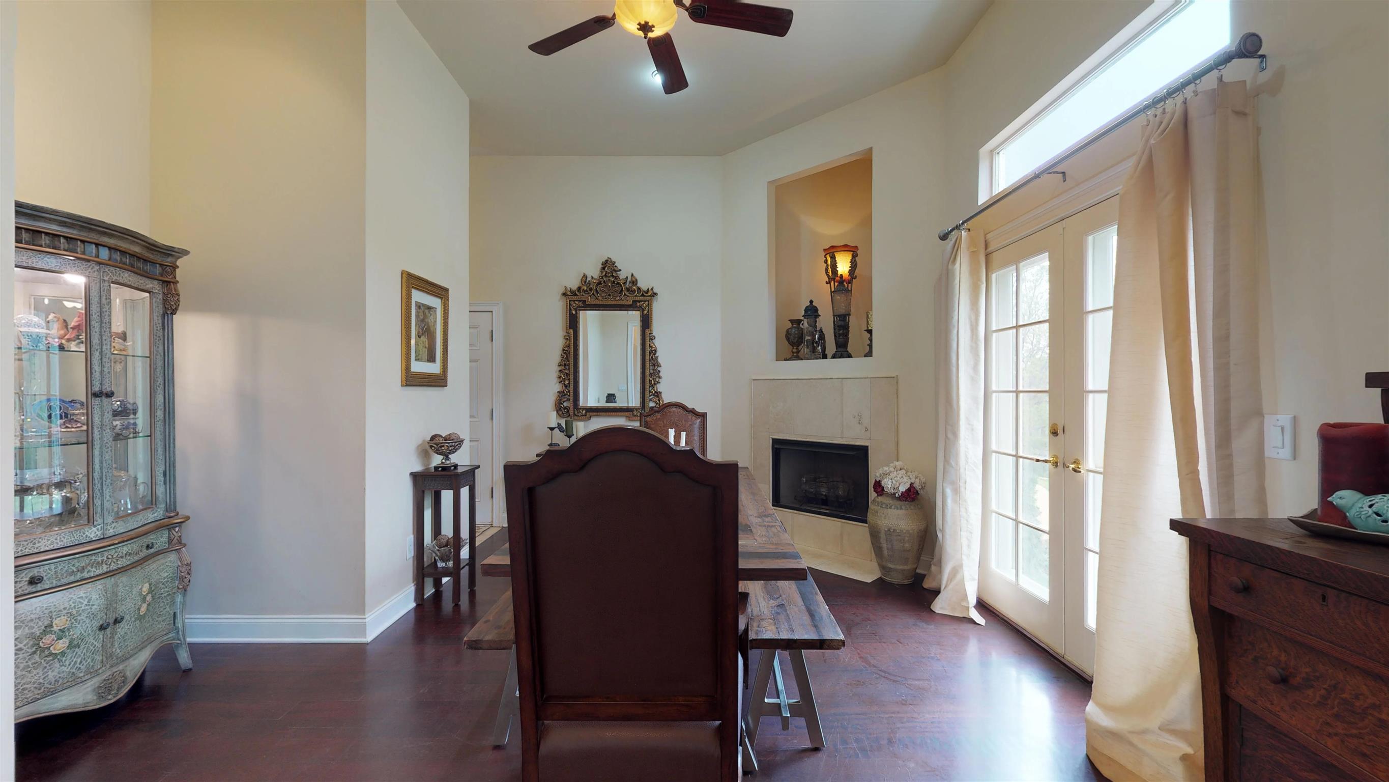 Banquet sized Dining Room with French Door and transom and a decorative niche 