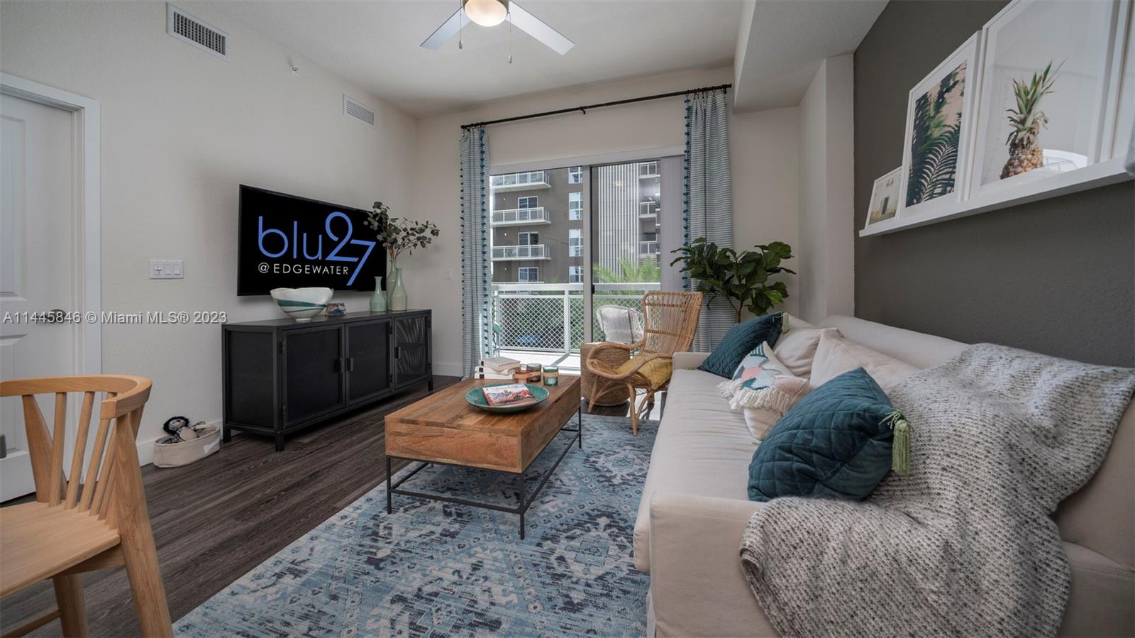 2701 Biscayne Boulevard, Unit 4111 Miami, FL 33137 - Photo 21 of 45 a living room with furniture a rug and a window