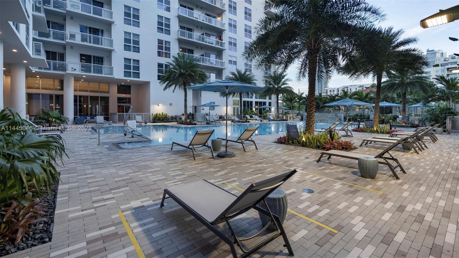 2701 Biscayne Boulevard, Unit 4111 Miami, FL 33137 - Photo 43 of 45 a view of backyard with outdoor seating and plants