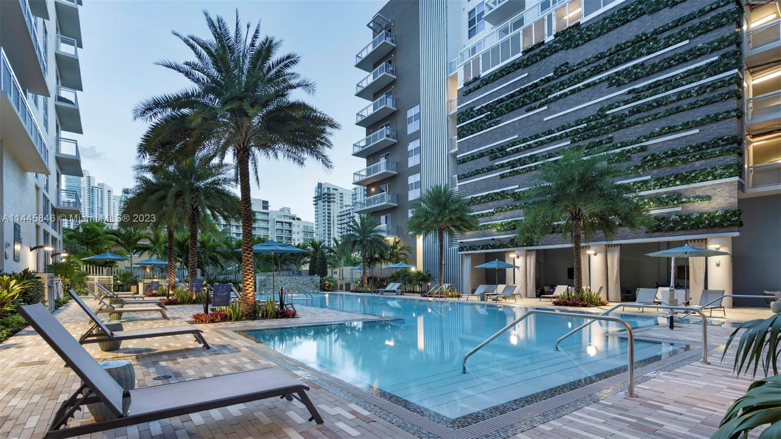 2701 Biscayne Boulevard, Unit 4111 Miami, FL 33137 - Photo 44 of 45 a view of house with swimming pool and sitting area