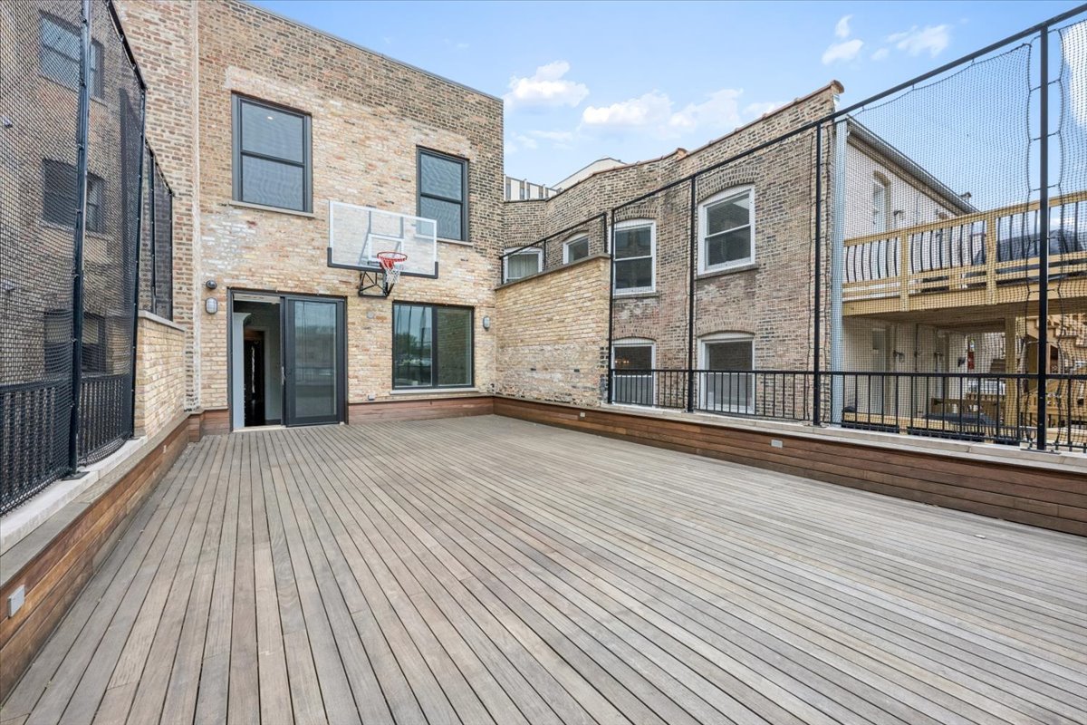 458 West Deming Place Chicago, IL 60614 - Photo 20 of 39 a view of a house with a roof deck
