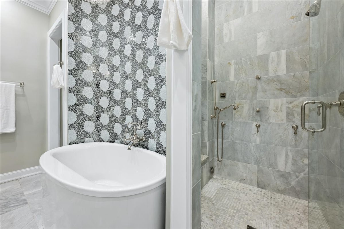 458 West Deming Place Chicago, IL 60614 - Photo 21 of 39 a bathroom with a bathtub and shower
