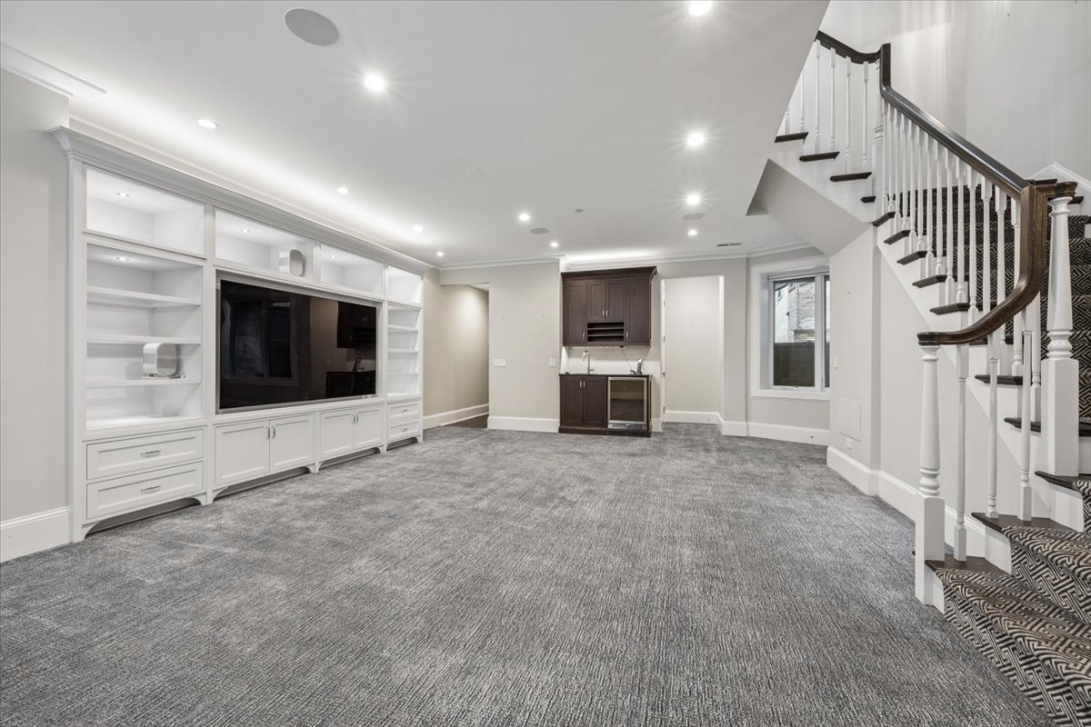 458 West Deming Place Chicago, IL 60614 - Photo 26 of 39 a view of an empty room with a fireplace and a window