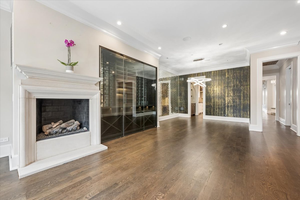 458 West Deming Place Chicago, IL 60614 - Photo 4 of 39 a view of a livingroom with wooden floor and a fireplace