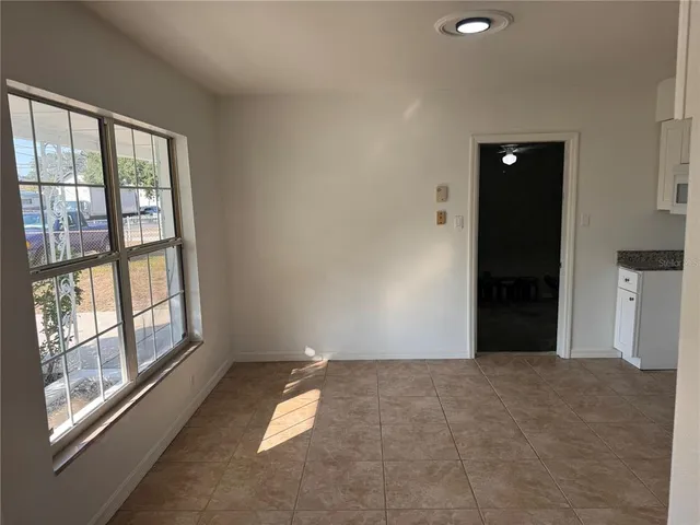 an empty room with windows